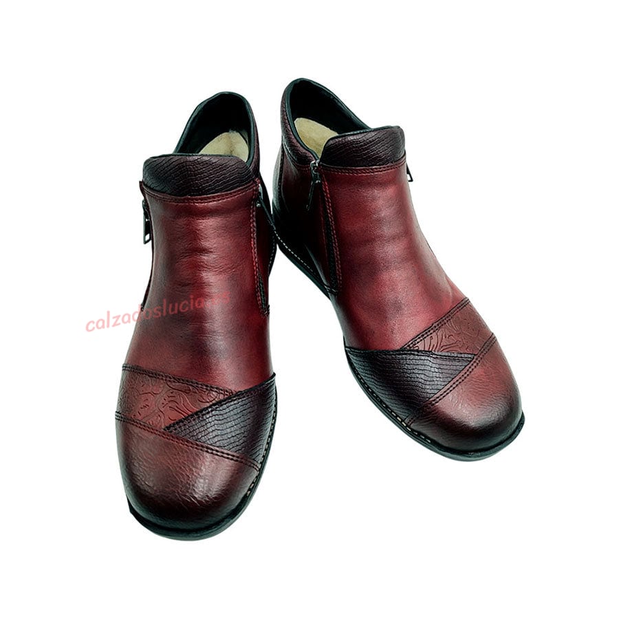 Botín Rieker en burdeos con forro de lana