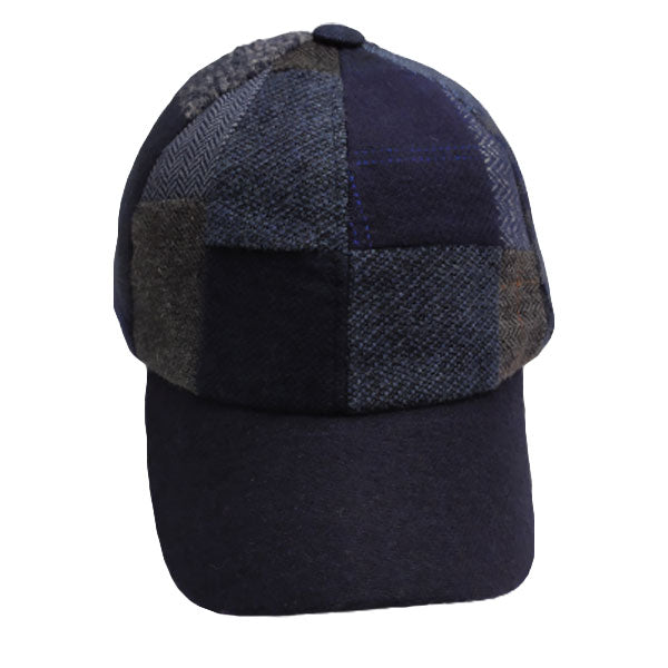 Gorra azul de patchwork con botón