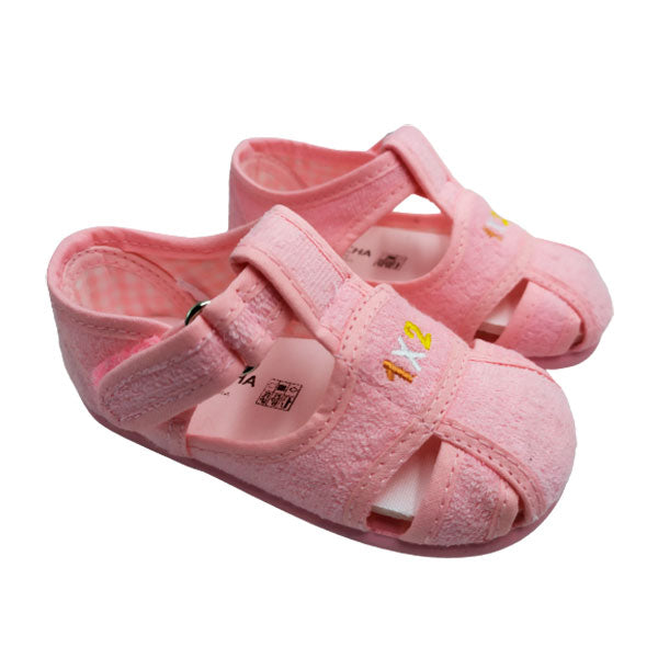 Sandalia de casa en rizo rosa para niña