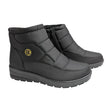 Botín bajo Pikarinas tipo anorak en color negro para mujer, vista lateral.