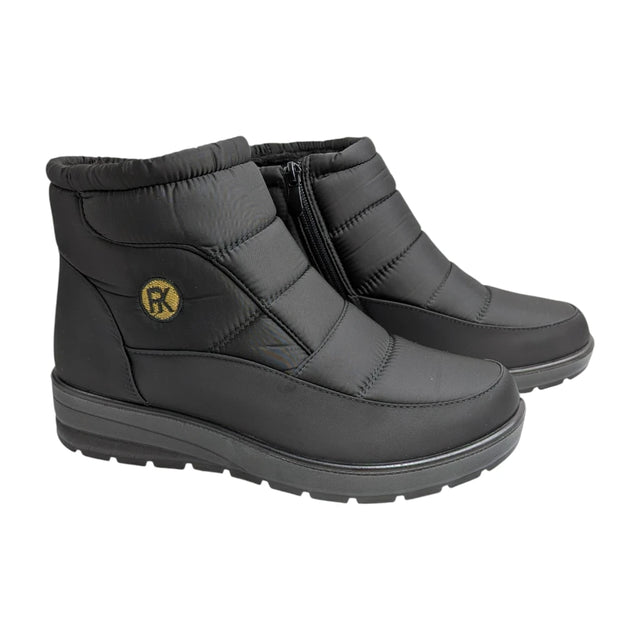 Botín bajo Pikarinas tipo anorak en color negro para mujer, vista lateral.