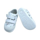 Deportivo de bebé con velcro y suela de goma, marca Titanitos con estampado de Dinosaurios.