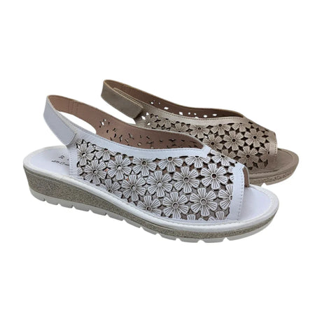Sandalia cómoda con estampado floral romántico de la marca Doctor Cutilla en blanco y en metalizado.