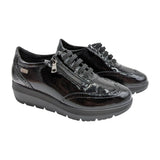 Zapato Doctor Cutillas 86050 en charol negro con cremallera lateral y cordones elásticos.