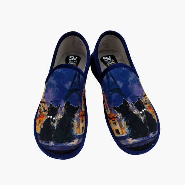 Zapatilla gatitos en la noche